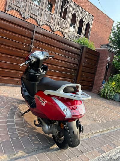 United 100cc scooty