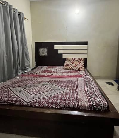 Bed and wardrobe