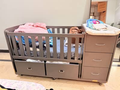 Baby cot bed with mattress and waterproof 5 inch mattress topper