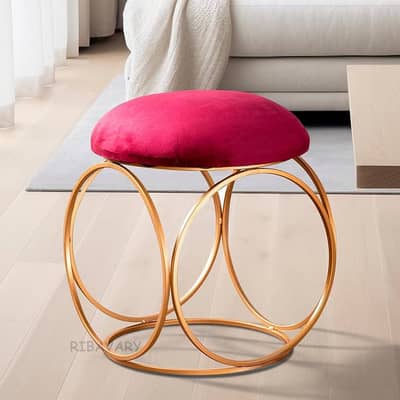 metal base and a cushioned velvet seat