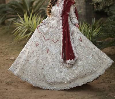 bridal dress ivory and maroon colour