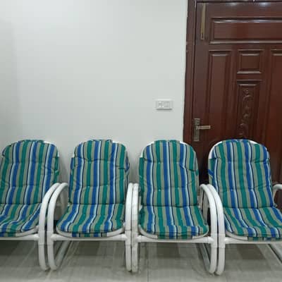 Garden Chairs with table and umbrella.