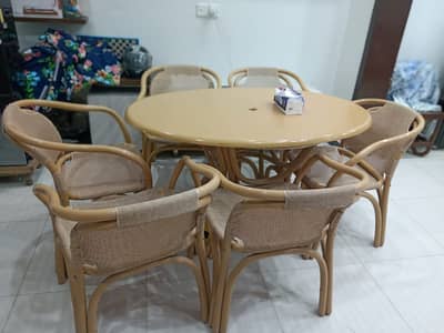 Dining table with chairs.