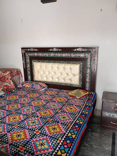 Bed with side tables