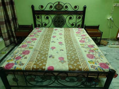 Very Solid Metal bed set with two side table for sale.