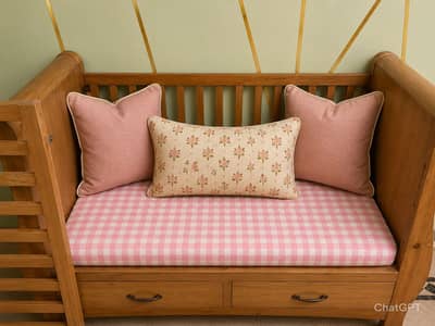 A wooden baby cot