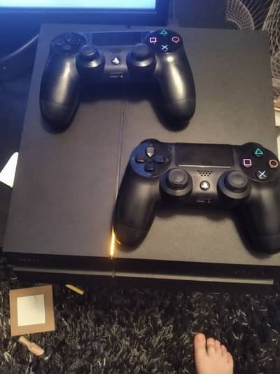 Playstation 4 fat with 2 controllers and 500gb storage with box