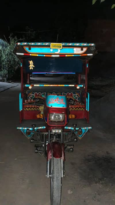 8 month use new brand rickshaw united bike 100 cc lahori body