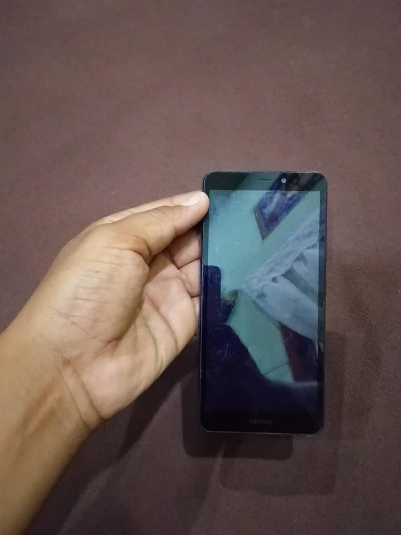 Nokia C100 1