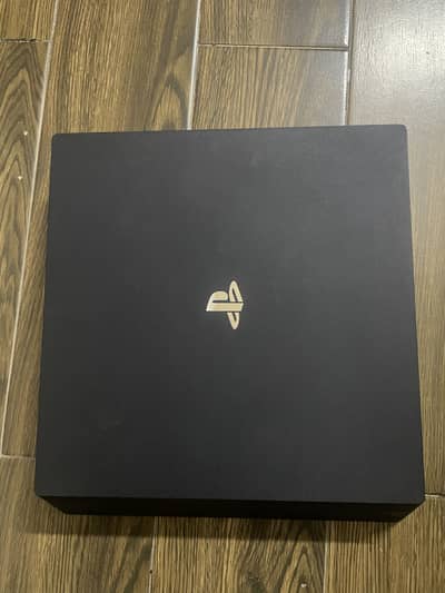 PlayStation 4 Pro Slight Used With Box and 3 Games without controller