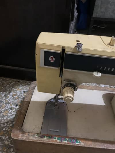 Sewing machine with original moter belt