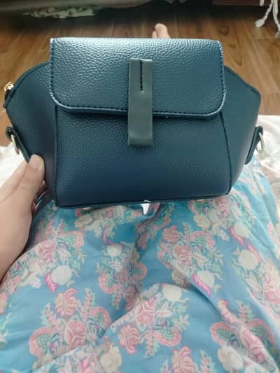 blue crossbody bag