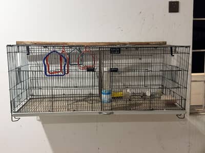 Large cage have 4 breeding box openings and breeding box available