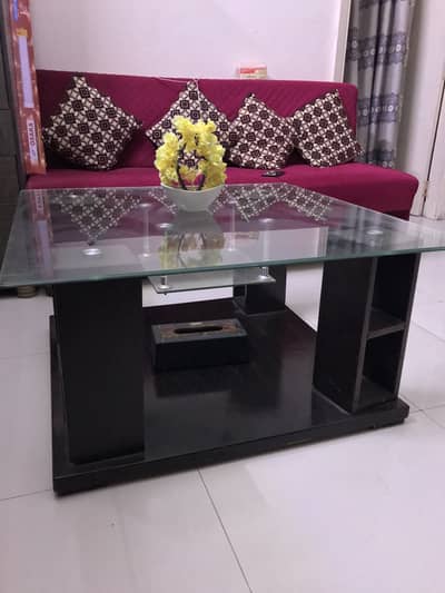 Wooden table with glass