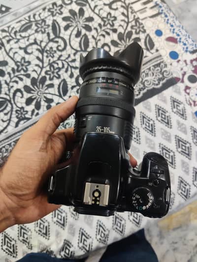 canon 1000d dslr camera with 35-105mm manual lens