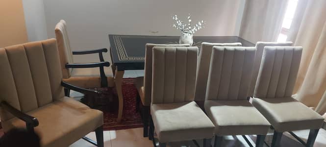 Wooden dining table with 6 chairs