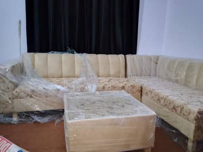 L shape 6 seater sofa with table . ( 03709572012). whatsup