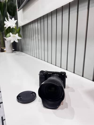 Sony a6400 with sigma 16mm f/1.4 lens