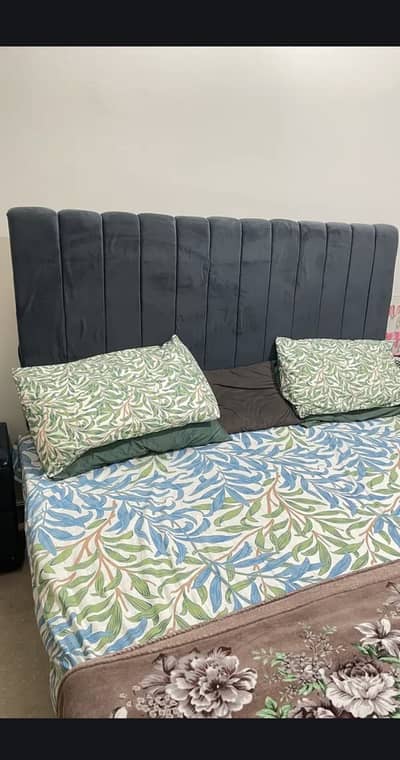King size bed with side tables and mattress