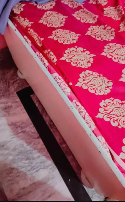 singal bed with spring mattress with side table, and dinner table larg