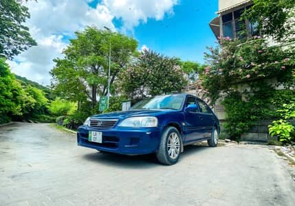 Blue Honda City 2002