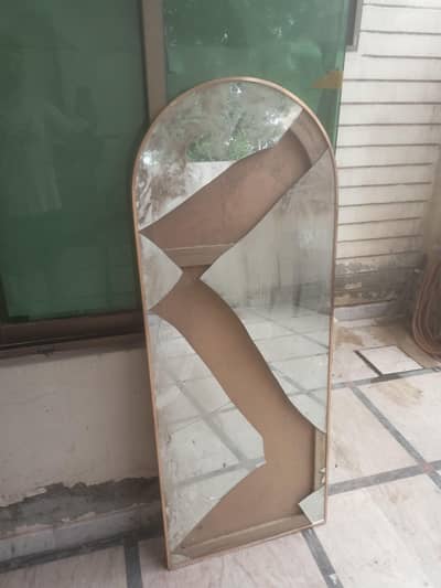 broken mirror with perfect frame