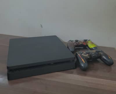 PS 4 WITH 2 CONTROLLER AND 3 GAME CDS