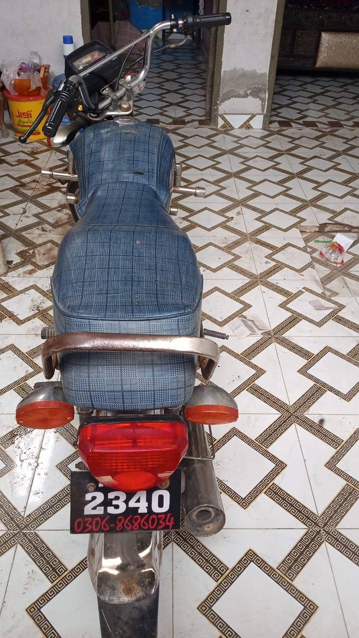 Dhoom 70cc 3