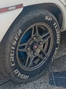 Suzuki mehran alloy rim and tyres 12'' for sale near Rawat