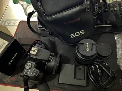 Canon 250d DSLR camera with kit lens and 50mm lens