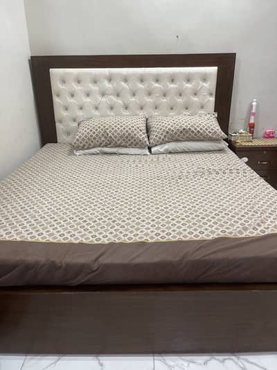 Bed with side tables
