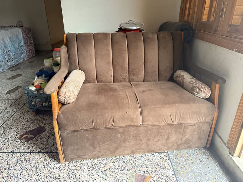 Brown tufted sofa 1