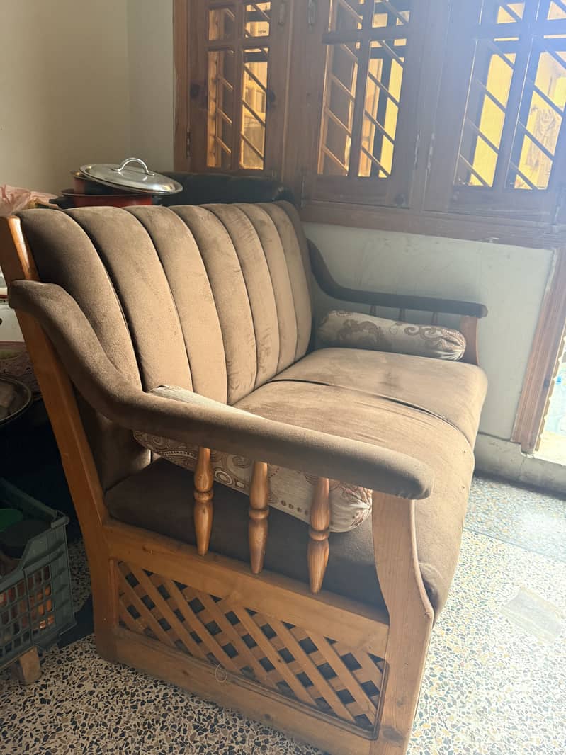 Brown tufted sofa 2