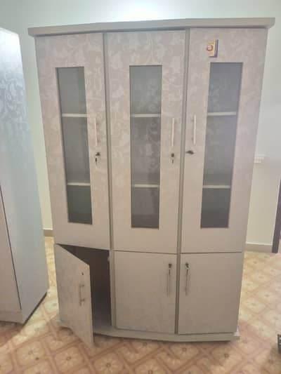 The wardrobe is used but well maintained.