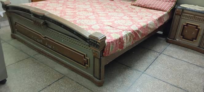 bed and dressing table and side tables