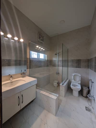 F-10 (Villa) 1 Kanal Excellent Double Story House Modern Fittings Along With Tile And Wooden Flooring Proper 5 bedrooms, 5 Attached New Bathrooms Drawing Dining, TV Lounge, Kitchen, ACs Installed