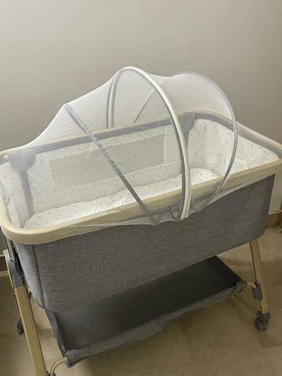 Gray baby cot for born babies