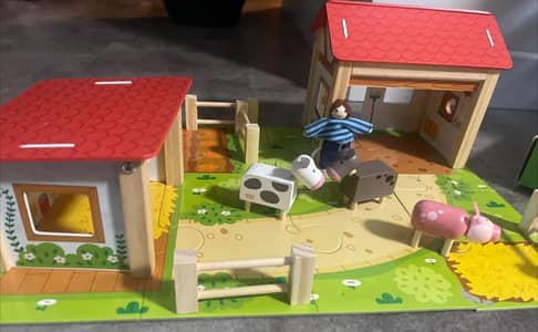 farm with animals and barn