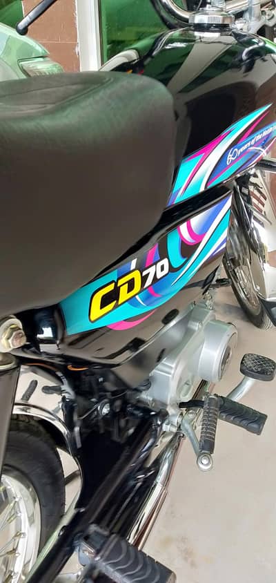 Honda CD 70 2024 model black colour Islamabad number