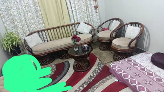 sofa set round table and vase