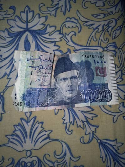 Little torn 1000 ruppes note