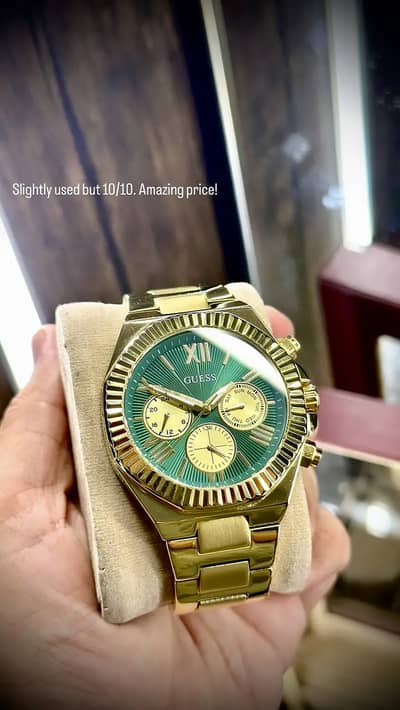 Guess brand golden green two tone dial watch