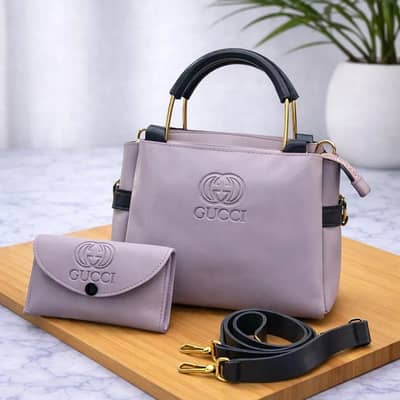 Brand new leather hand bag with best quality with a purse.