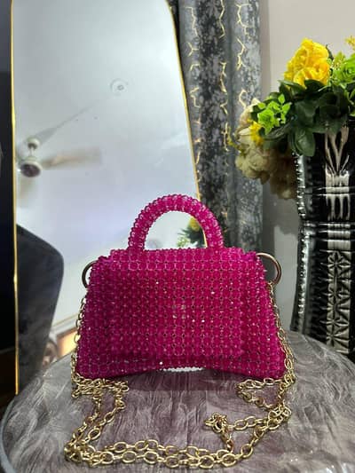 half moon shape Beaded bag to make you look perfect 