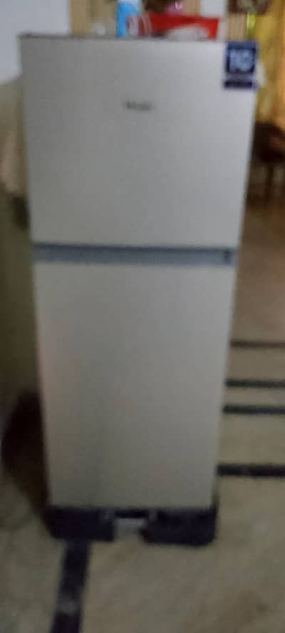 haier small frigh 2 doors 5 month used warranty mein hai