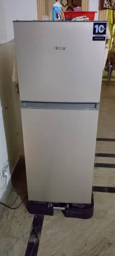 haier small frigh 2 doors 8 month used warranty mein hai