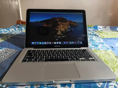 MacBook Pro (13-inch, Mid 2012) with charger