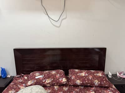 King size bed almost new with 2 side tables