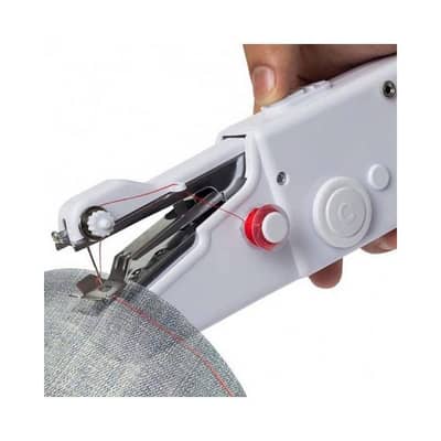 the held hand sewing machine