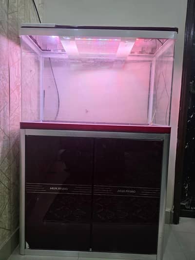 aquarium with lights and cupboards